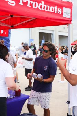 Guests networking at The Triton's Crew, Captains & Connections event at Nautical Ventures Marina.