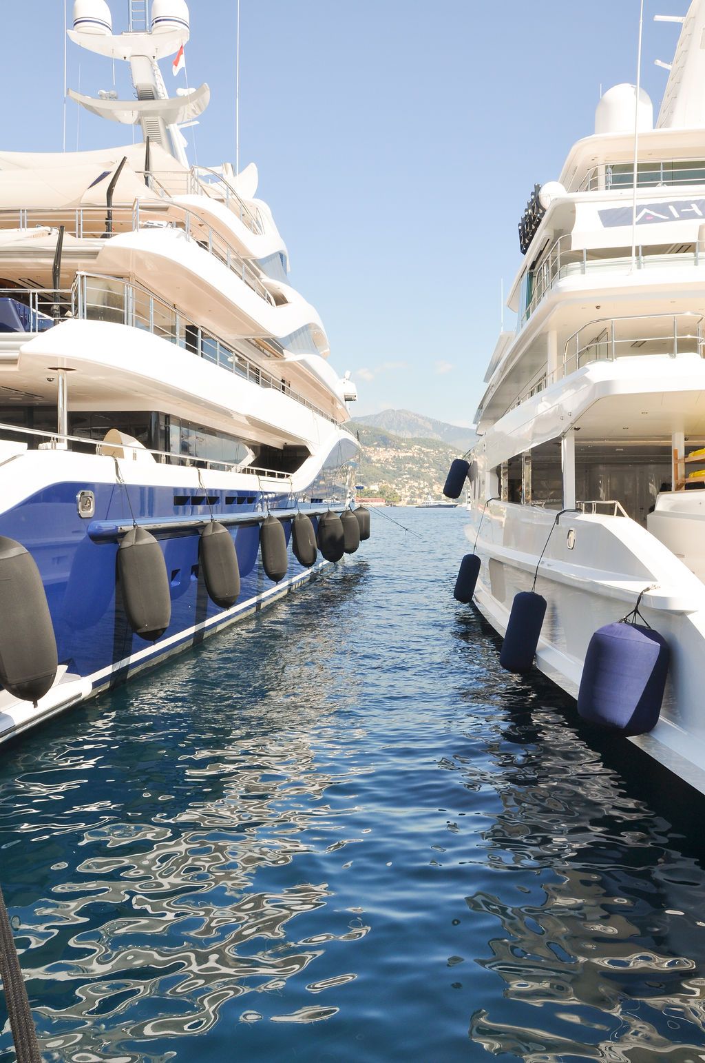 Yachts and crew on the docks at the 2026 Monaco Yacht Show in Port Hercule, Monaco.