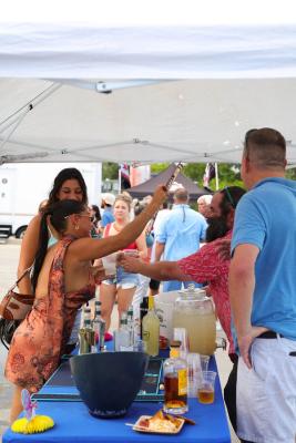 Guests networking at The Triton's Crew, Captains & Connections event at Nautical Ventures Marina.