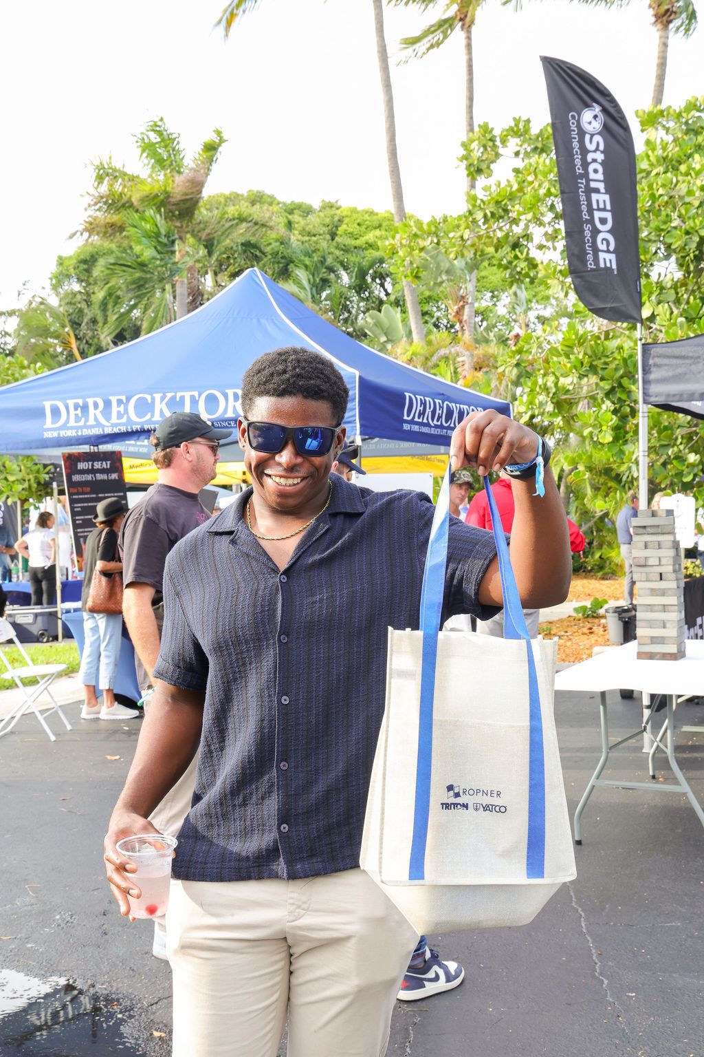 Guests and exhibitors at The Triton's Fall Triton Expo at Bahia Mar Yachting Center.