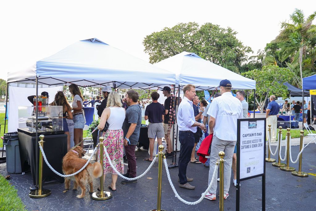 Guests and exhibitors at The Triton's Fall Triton Expo at Bahia Mar Yachting Center.