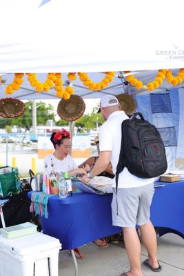Guests networking at The Triton's Crew, Captains & Connections event at Nautical Ventures Marina.