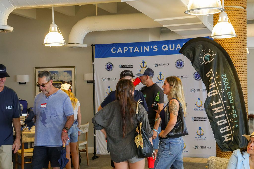 Guests and exhibitors at The Triton's Fall Triton Expo at Bahia Mar Yachting Center.