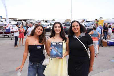 Guests networking at The Triton's Crew, Captains & Connections event at Nautical Ventures Marina.