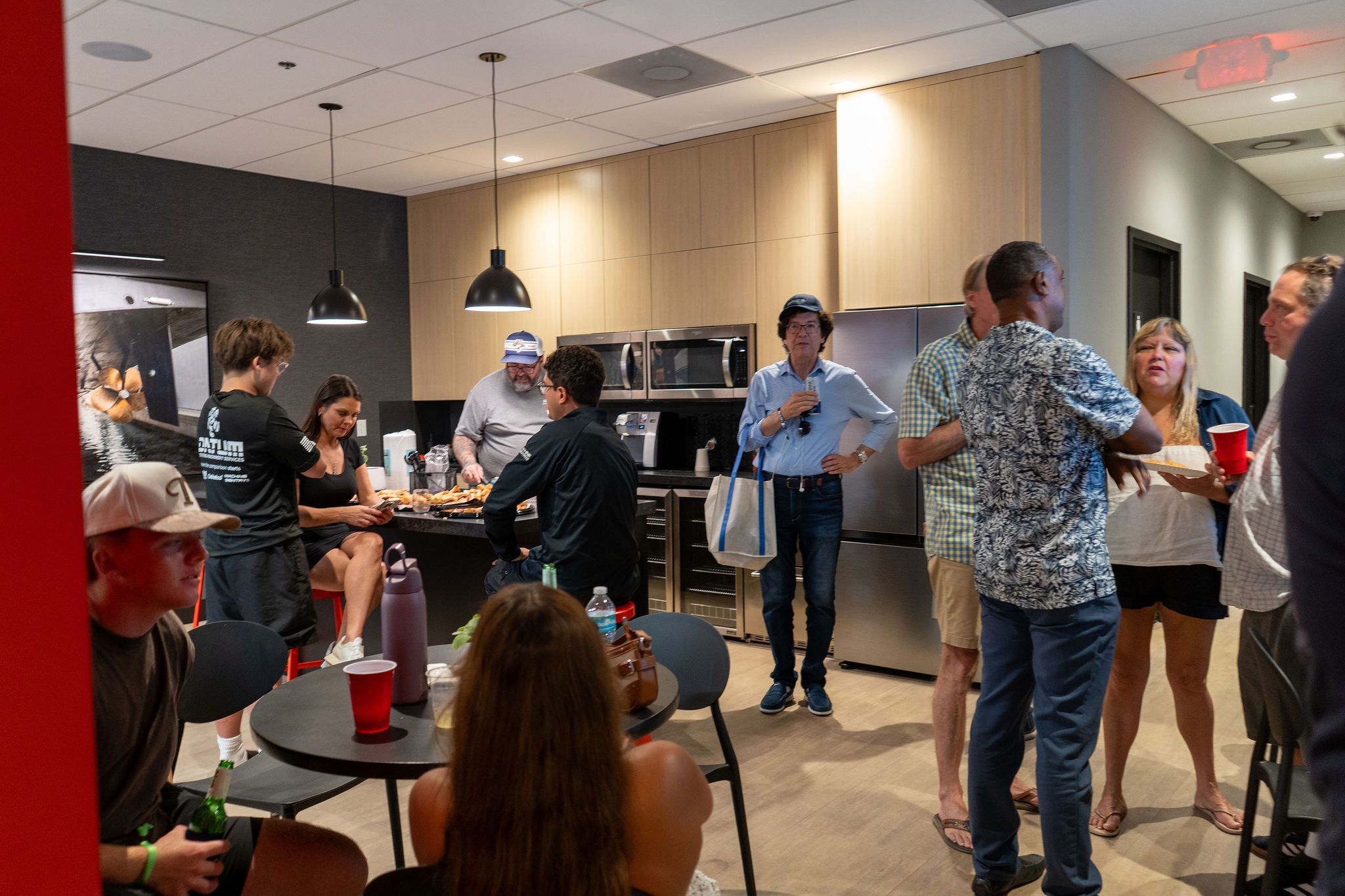 Guests networking at The Triton's Crew, Captains & Connections event at DATUM RMS.