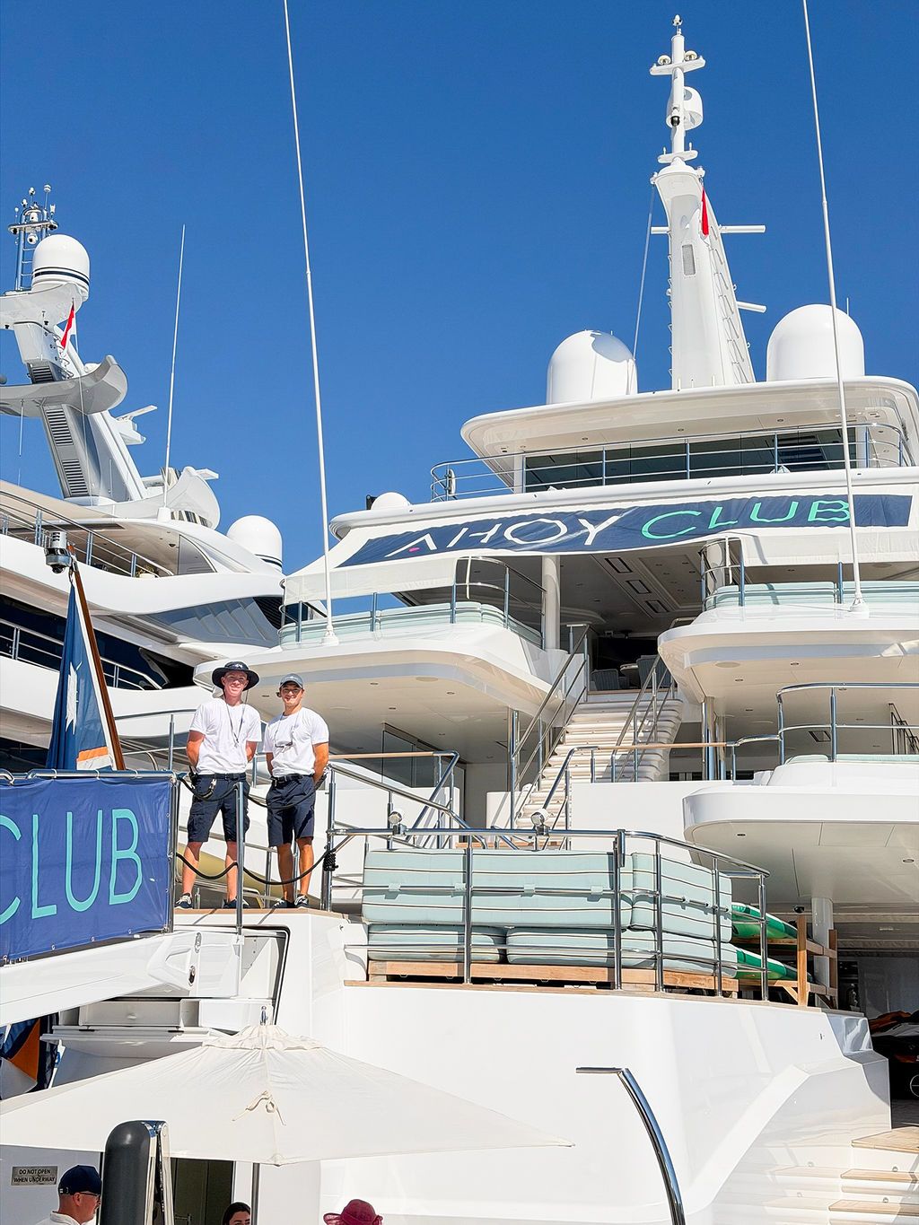 Yachts and crew on the docks at the 2026 Monaco Yacht Show in Port Hercule, Monaco.