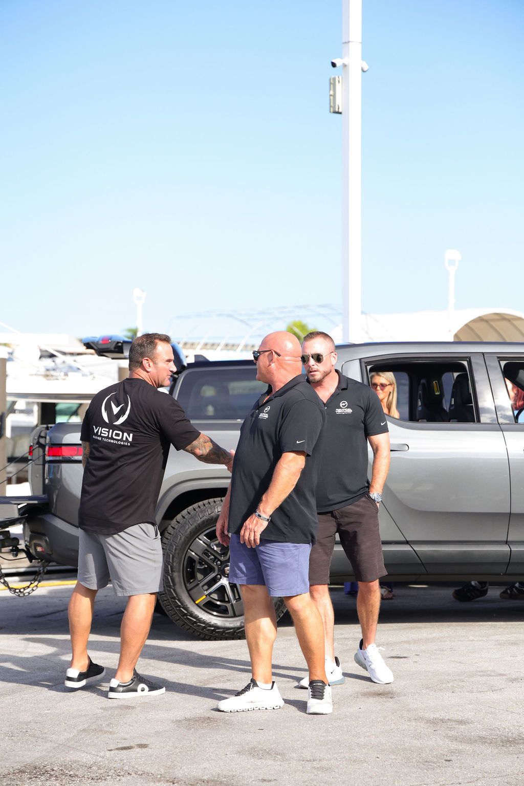 Guests networking at The Triton's Crew, Captains & Connections event at Nautical Ventures Marina.
