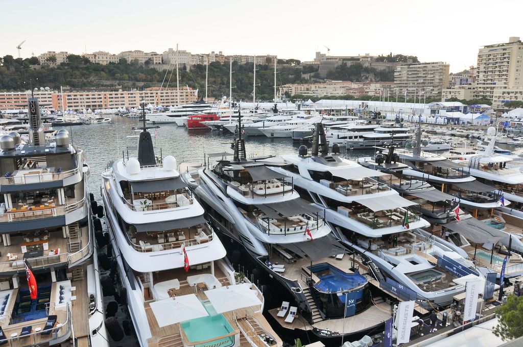 Yachts and crew on the docks at the 2026 Monaco Yacht Show in Port Hercule, Monaco.