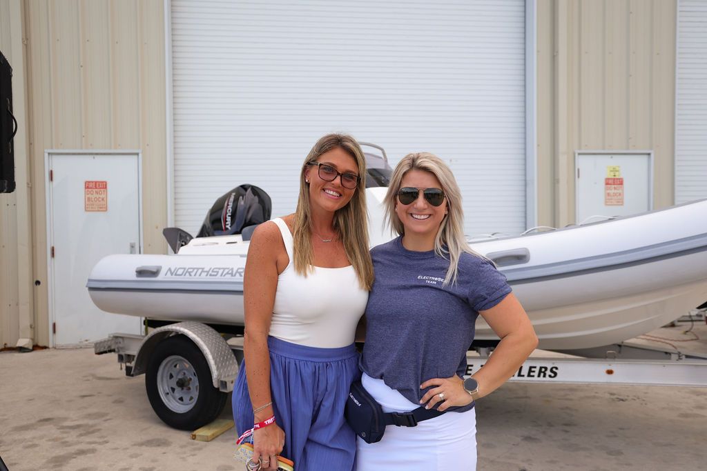 Guests networking at The Triton's Crew, Captains & Connections event at Nautical Ventures Marina.