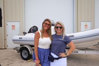 Guests networking at The Triton's Crew, Captains & Connections event at Nautical Ventures Marina.
