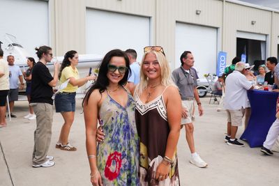 Guests networking at The Triton's Crew, Captains & Connections event at Nautical Ventures Marina.