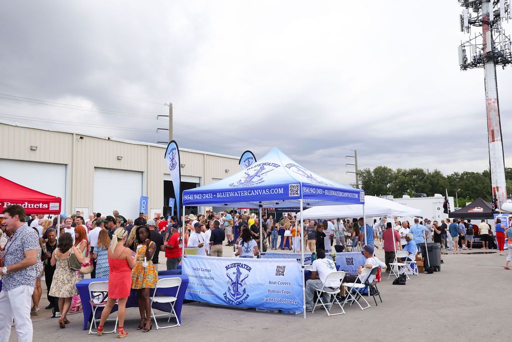 Guests networking at The Triton's Crew, Captains & Connections event at Nautical Ventures Marina.