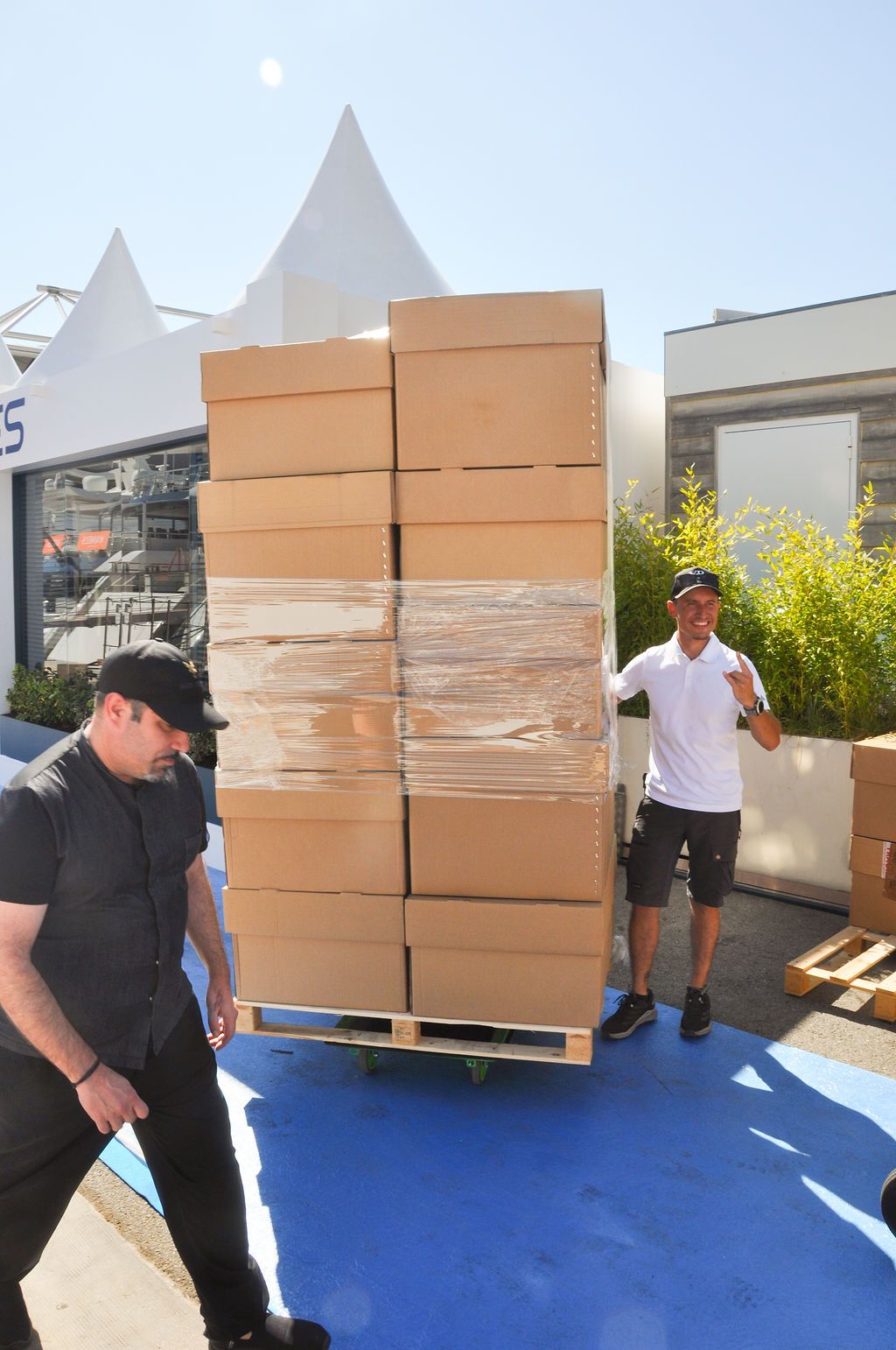 Yachts and crew on the docks at the 2026 Monaco Yacht Show in Port Hercule, Monaco.