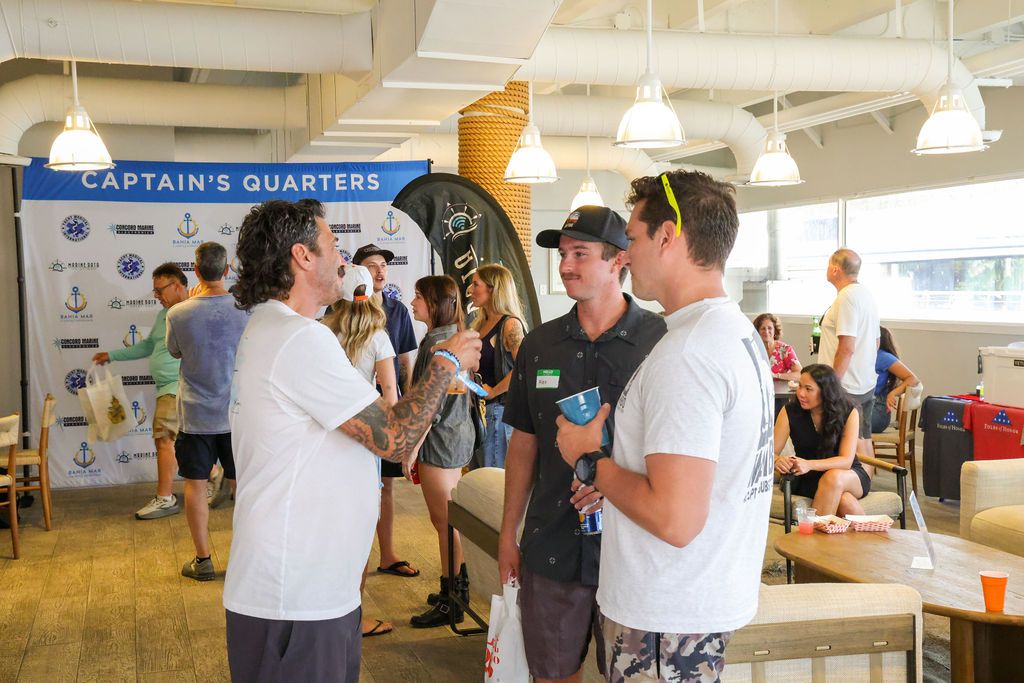 Guests and exhibitors at The Triton's Fall Triton Expo at Bahia Mar Yachting Center.