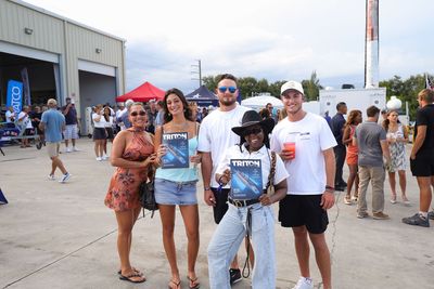 Guests networking at The Triton's Crew, Captains & Connections event at Nautical Ventures Marina.