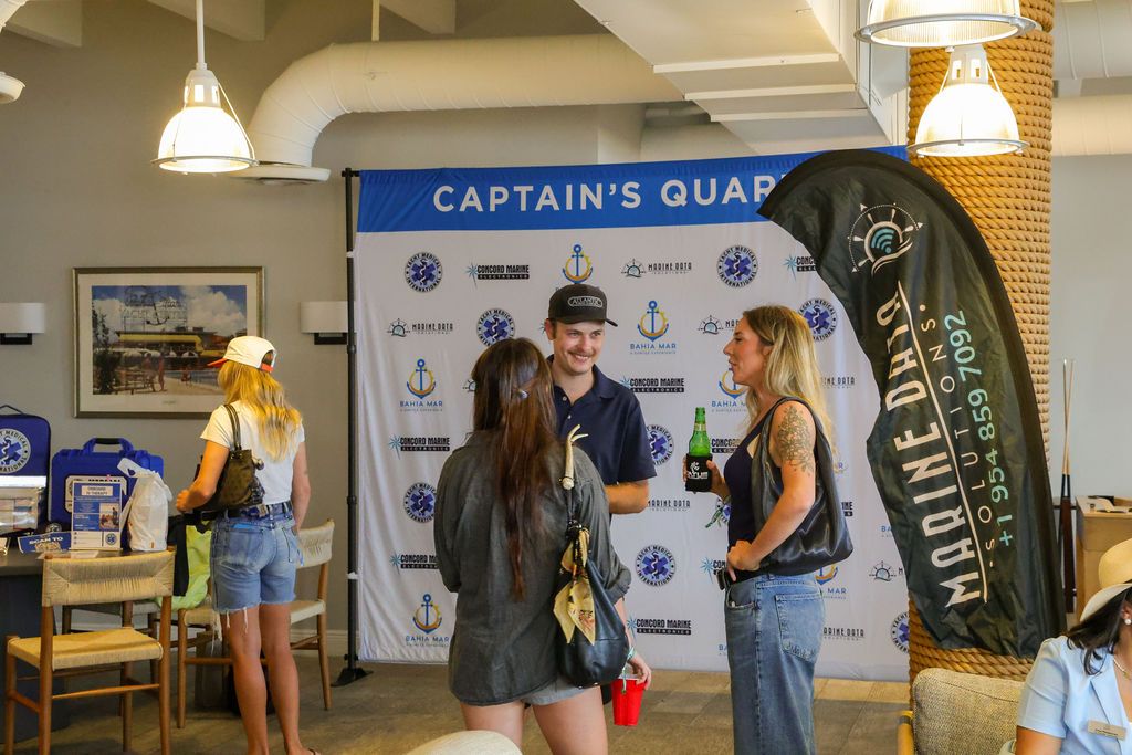 Guests and exhibitors at The Triton's Fall Triton Expo at Bahia Mar Yachting Center.