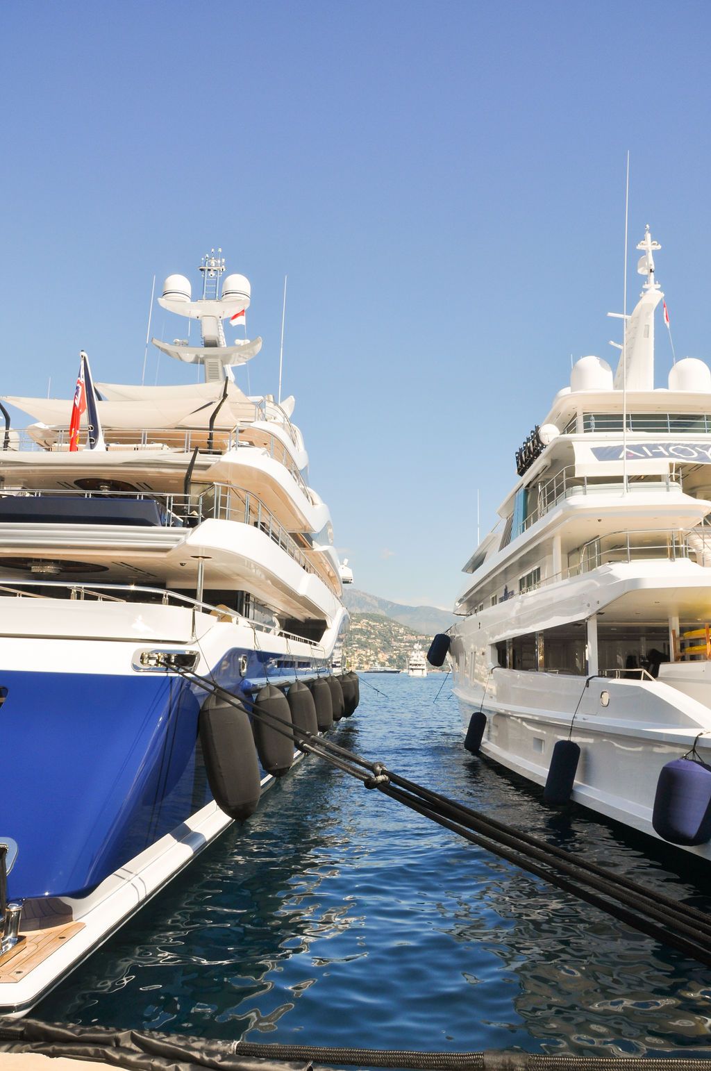 Yachts and crew on the docks at the 2026 Monaco Yacht Show in Port Hercule, Monaco.