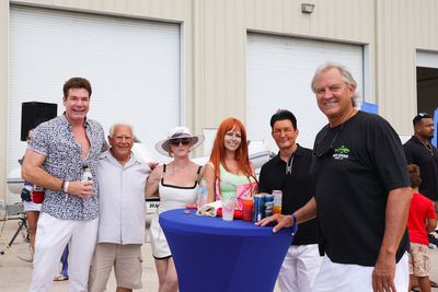 Guests networking at The Triton's Crew, Captains & Connections event at Nautical Ventures Marina.