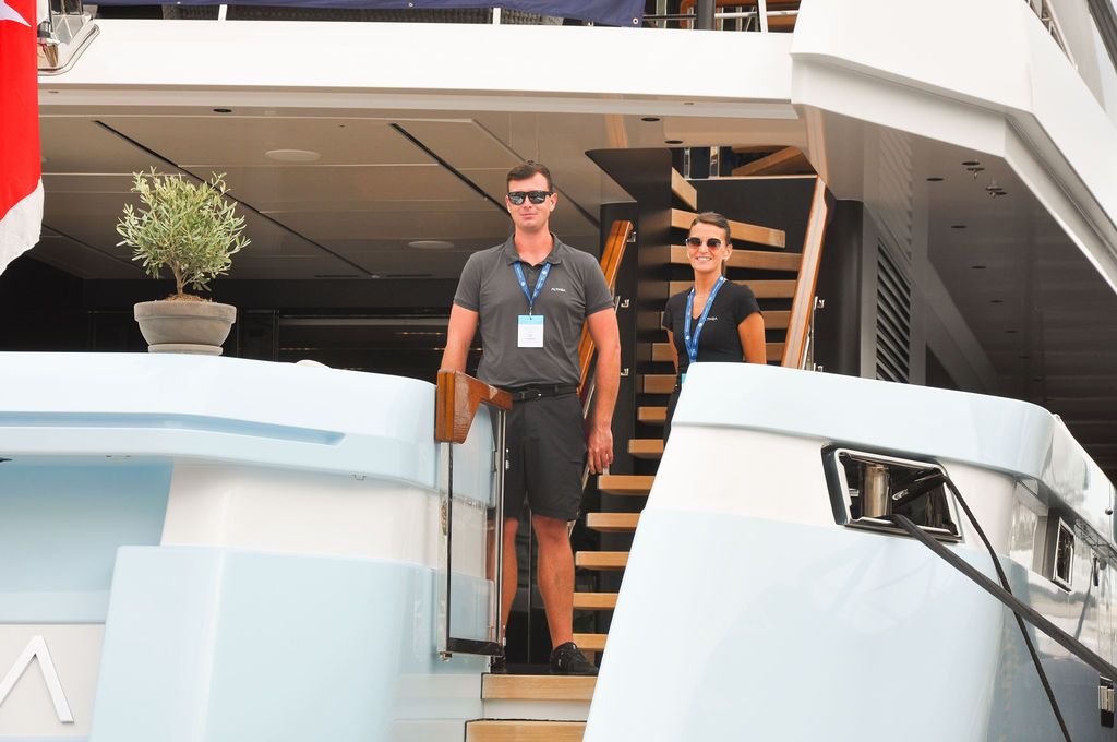 Yachts and crew on the docks at the 2026 Monaco Yacht Show in Port Hercule, Monaco.