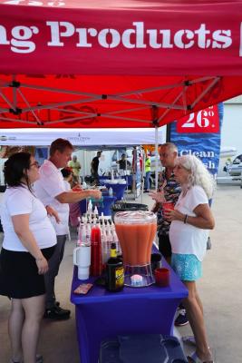 Guests networking at The Triton's Crew, Captains & Connections event at Nautical Ventures Marina.
