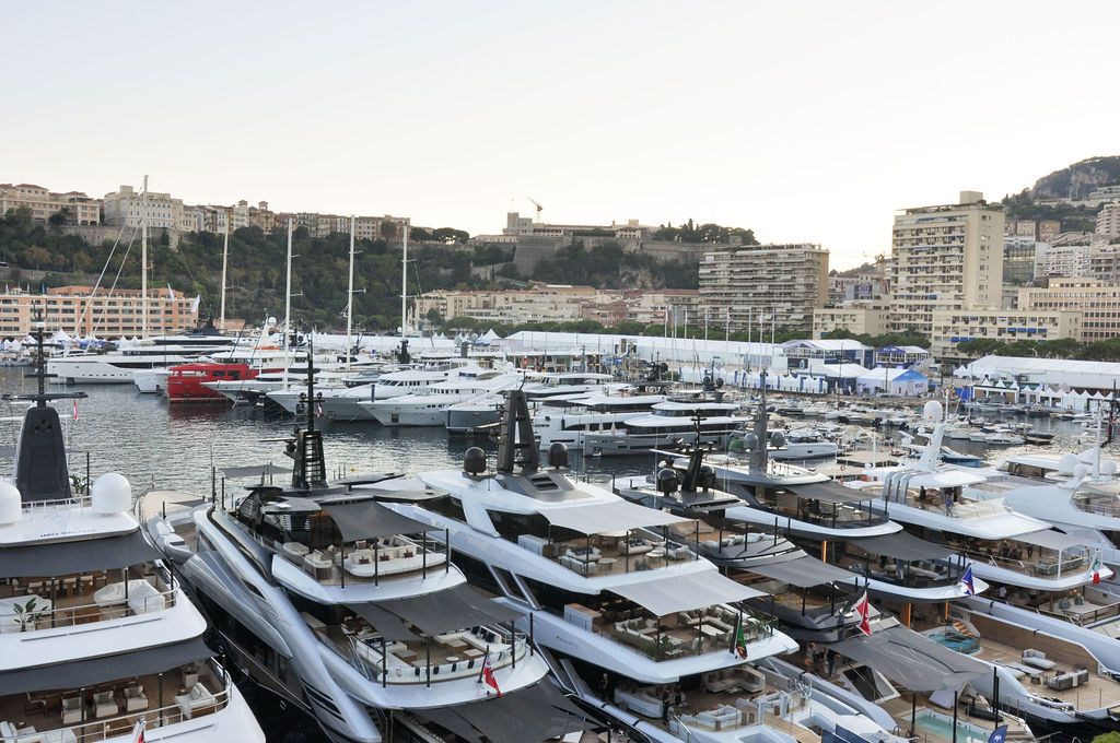 Yachts and crew on the docks at the 2026 Monaco Yacht Show in Port Hercule, Monaco.