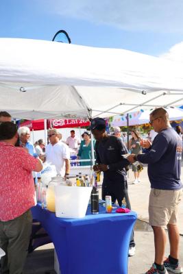 Guests networking at The Triton's Crew, Captains & Connections event at Nautical Ventures Marina.