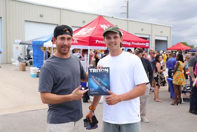 Guests networking at The Triton's Crew, Captains & Connections event at Nautical Ventures Marina.