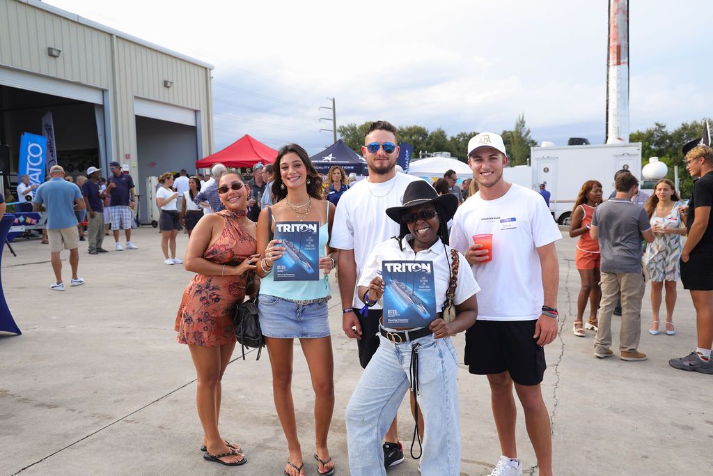Guests networking at The Triton's Crew, Captains & Connections event at Nautical Ventures Marina.