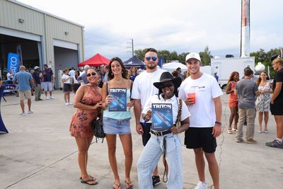 Guests networking at The Triton's Crew, Captains & Connections event at Nautical Ventures Marina.