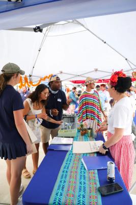 Guests networking at The Triton's Crew, Captains & Connections event at Nautical Ventures Marina.