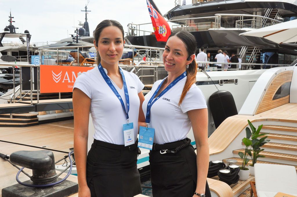 Yachts and crew on the docks at the 2026 Monaco Yacht Show in Port Hercule, Monaco.