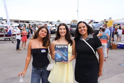 Guests networking at The Triton's Crew, Captains & Connections event at Nautical Ventures Marina.