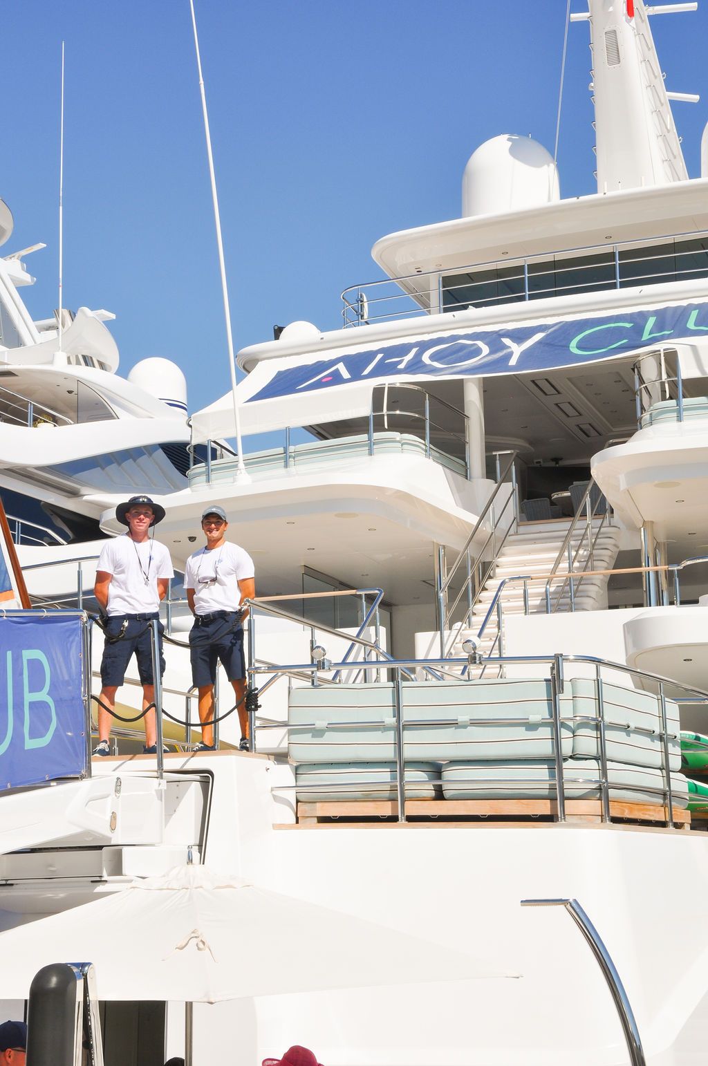 Yachts and crew on the docks at the 2026 Monaco Yacht Show in Port Hercule, Monaco.