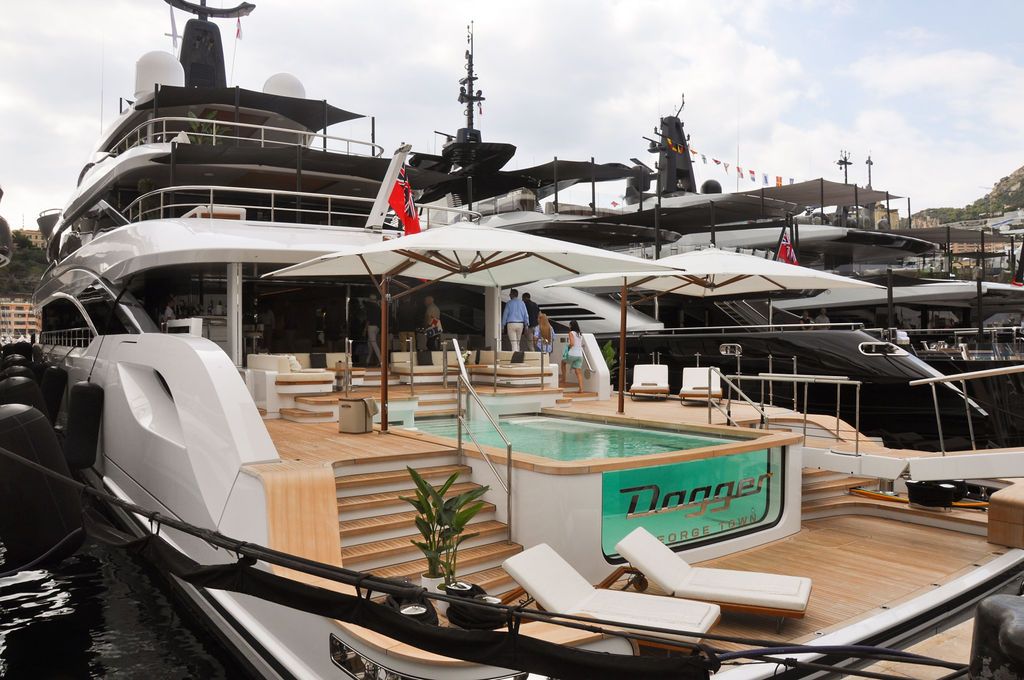 Yachts and crew on the docks at the 2026 Monaco Yacht Show in Port Hercule, Monaco.