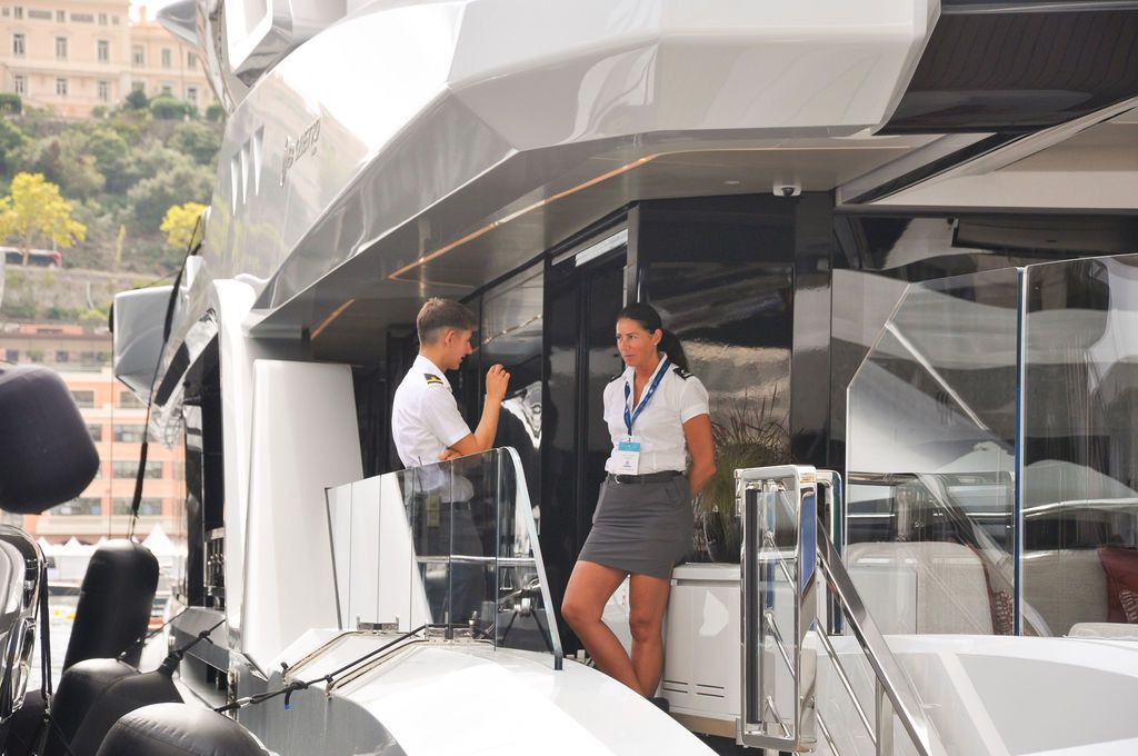 Yachts and crew on the docks at the 2026 Monaco Yacht Show in Port Hercule, Monaco.