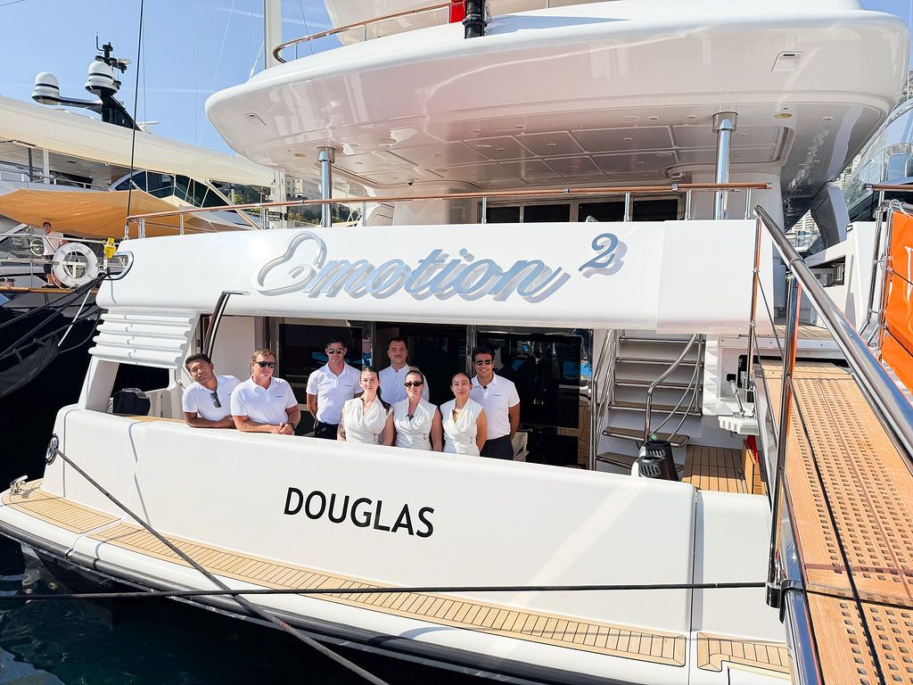 Yachts and crew on the docks at the 2026 Monaco Yacht Show in Port Hercule, Monaco.