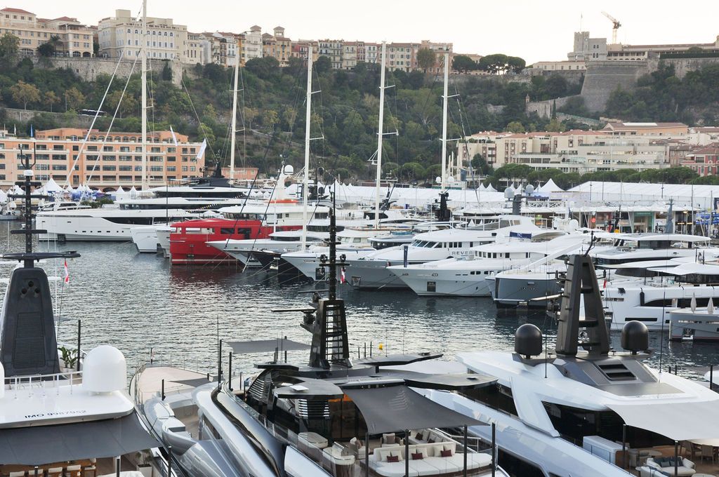 Yachts and crew on the docks at the 2026 Monaco Yacht Show in Port Hercule, Monaco.