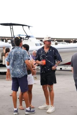 Guests networking at The Triton's Crew, Captains & Connections event at Nautical Ventures Marina.