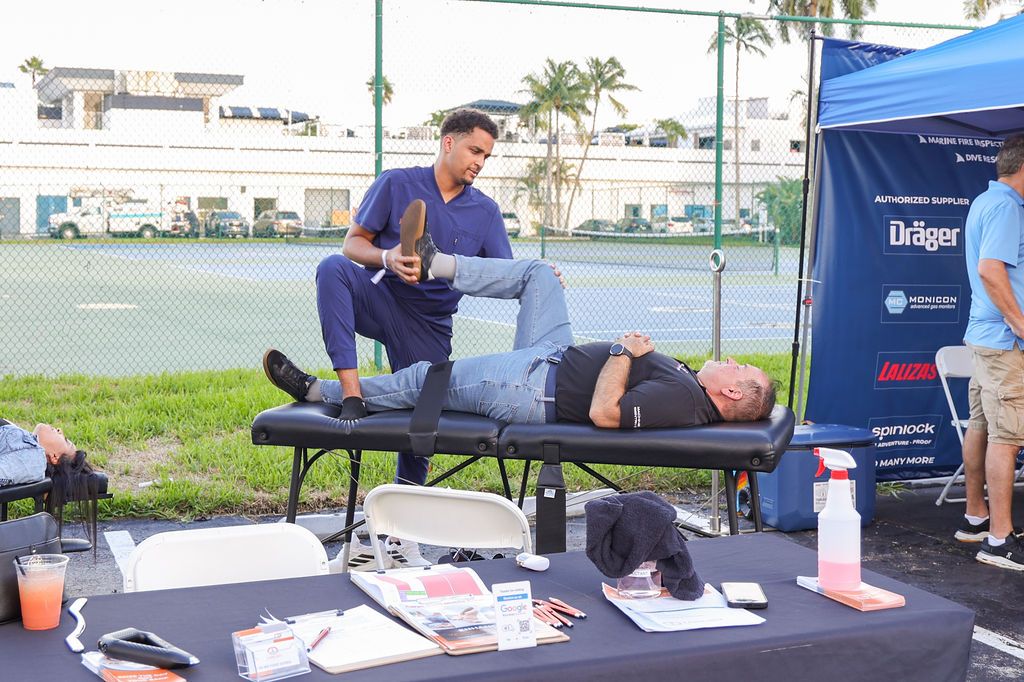 Guests and exhibitors at The Triton's Fall Triton Expo at Bahia Mar Yachting Center.
