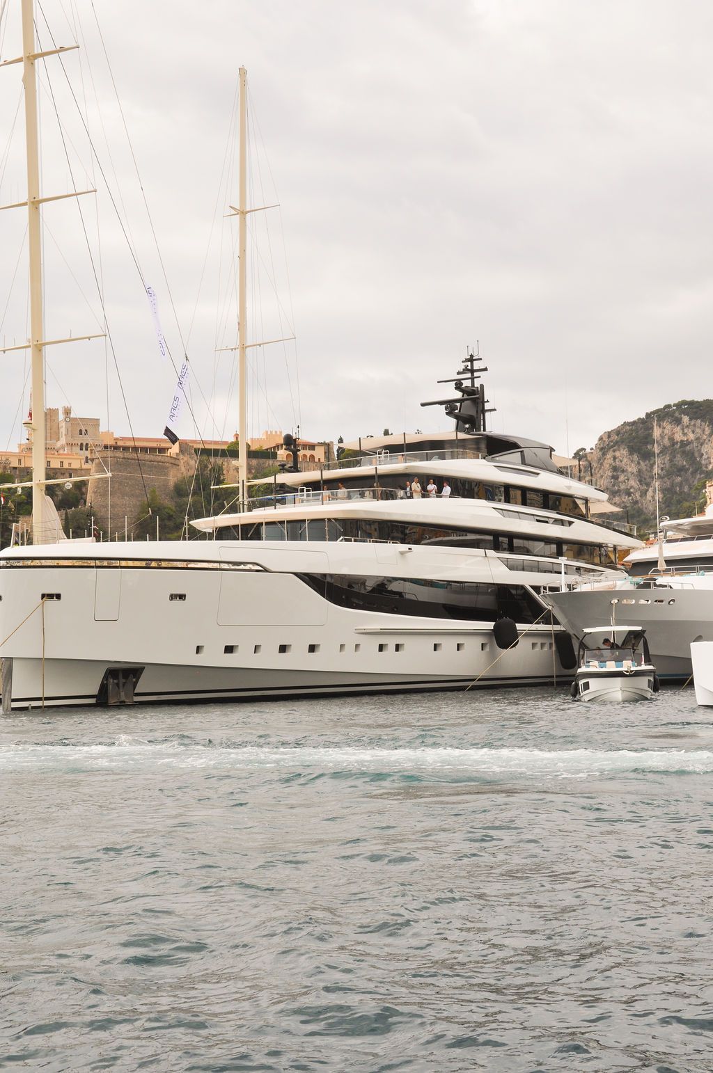 Yachts and crew on the docks at the 2026 Monaco Yacht Show in Port Hercule, Monaco.
