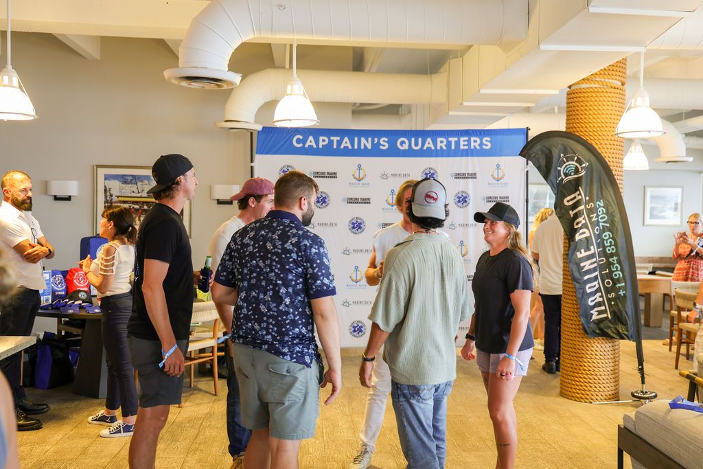 Guests and exhibitors at The Triton's Fall Triton Expo at Bahia Mar Yachting Center.