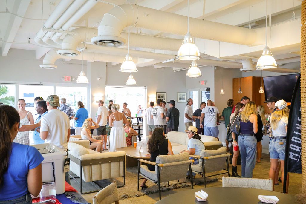 Guests and exhibitors at The Triton's Fall Triton Expo at Bahia Mar Yachting Center.