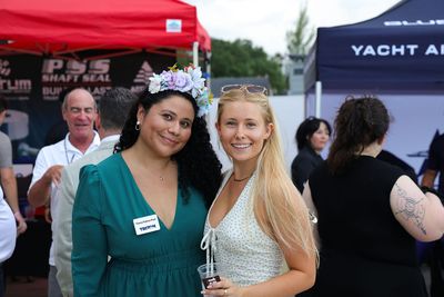 Guests networking at The Triton's Crew, Captains & Connections event at Nautical Ventures Marina.