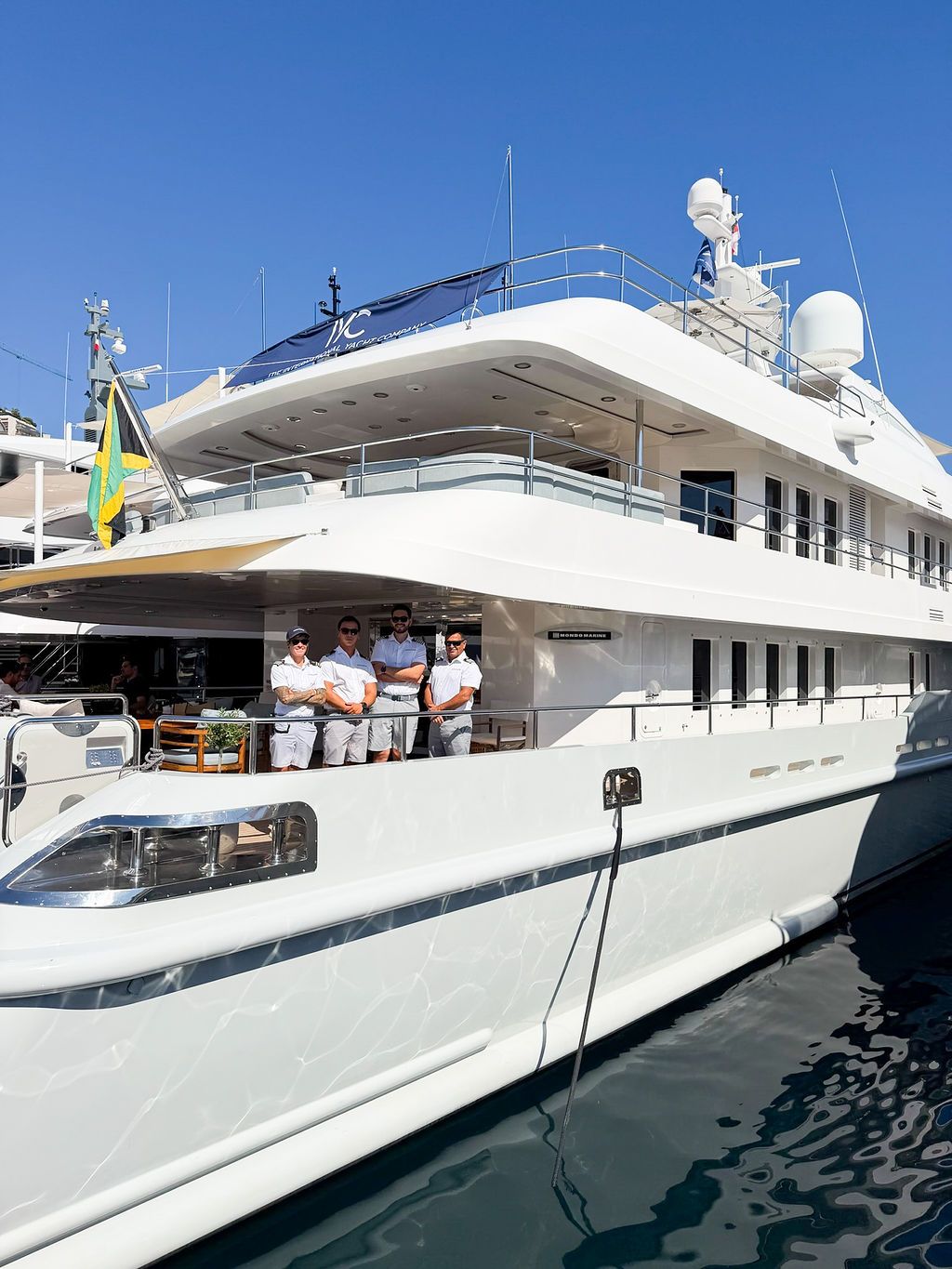 Yachts and crew on the docks at the 2026 Monaco Yacht Show in Port Hercule, Monaco.