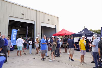 Guests networking at The Triton's Crew, Captains & Connections event at Nautical Ventures Marina.