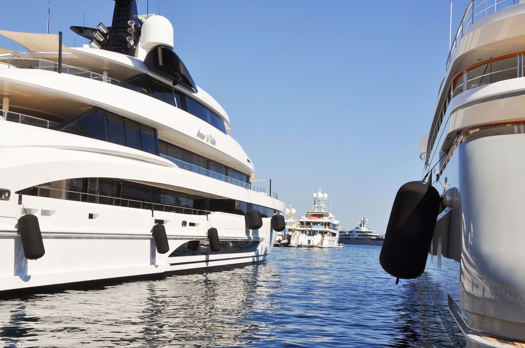 Yachts and crew on the docks at the 2026 Monaco Yacht Show in Port Hercule, Monaco.