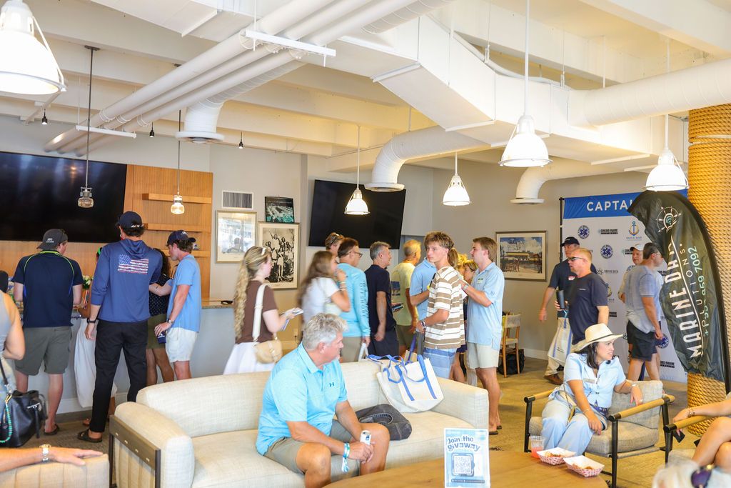 Guests and exhibitors at The Triton's Fall Triton Expo at Bahia Mar Yachting Center.