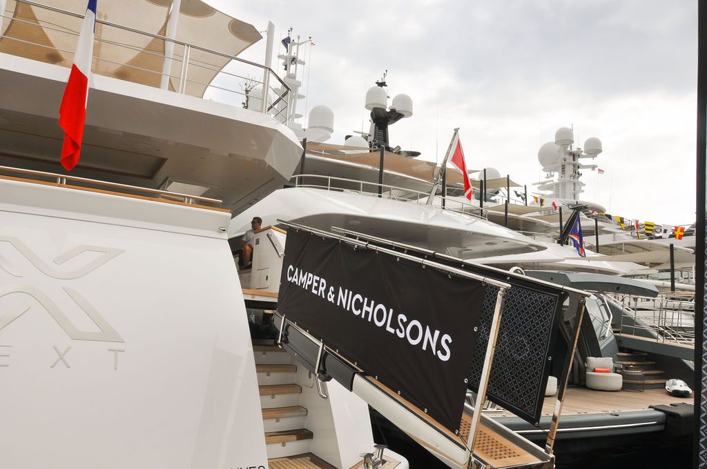 Yachts and crew on the docks at the 2026 Monaco Yacht Show in Port Hercule, Monaco.