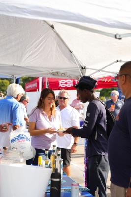 Guests networking at The Triton's Crew, Captains & Connections event at Nautical Ventures Marina.