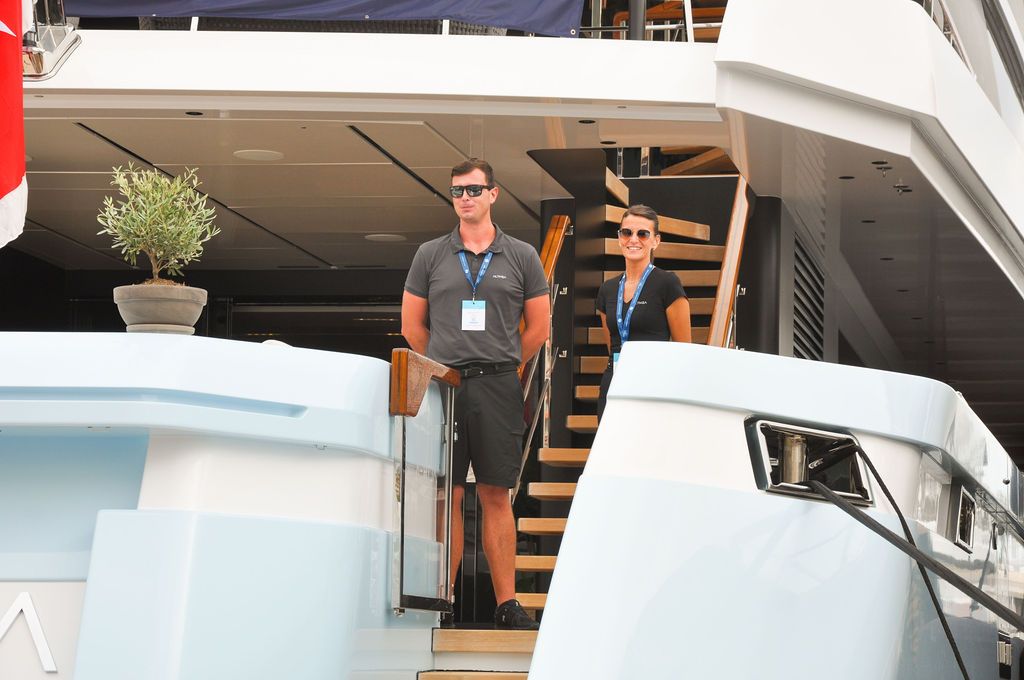 Yachts and crew on the docks at the 2026 Monaco Yacht Show in Port Hercule, Monaco.